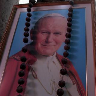 Une image du pape Jean Paul II durant une messe en son honneur à Managua (image d'illustration). [Reuters - Oswaldo Rivas]