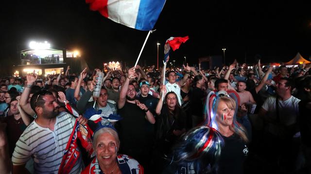La police n'a relevé aucun incident dans les fan zones lors du match France-Romanie. [Keystone - Claude Paris -AP Photo]