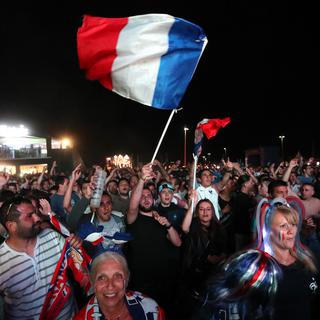 La police n'a relevé aucun incident dans les fan zones lors du match France-Romanie. [Keystone - Claude Paris -AP Photo]