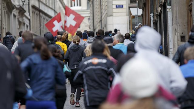 Des coureurs lors d'un entraînement de la Course de l'Escalade à Genève fin novembre. [Keystone - Salvatore Di Nolfi]