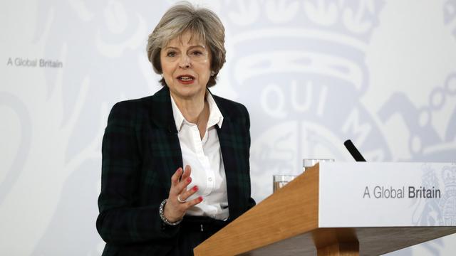 Theresa May s'exprime à Londres sur le Brexit. [Keystone - Kirsty Wigglesworth]