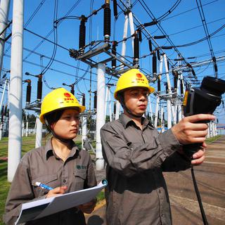 Plusieurs spécialistes pointent du doigt le fait que 65% de l’énergie électrique consommée en Chine provient du charbon. [Imaginechina/AFP - Hu guolin]