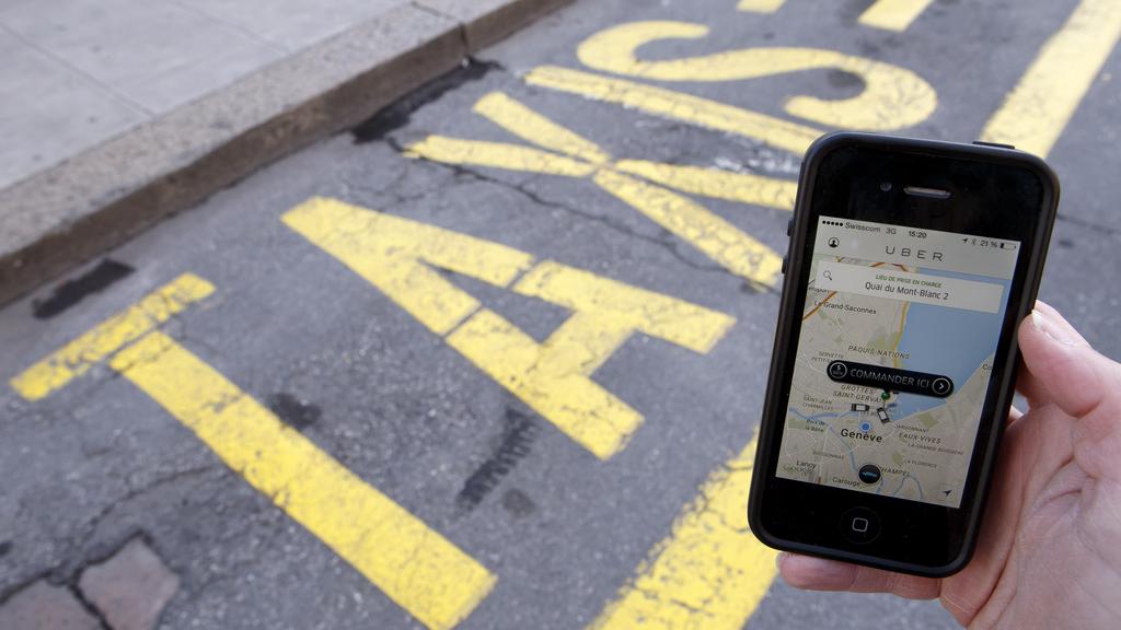 La nouvelle loi sur les taxis - surnommée "loi Uber" - entrera en vigueur le 1er juillet à Genève. [Keystone - Salvatore Di Nolfi]
