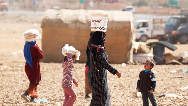 Des femmes et enfants de djihadistes étrangers se trouveraient aujourd'hui dans des camps. [Reuters - Erik De Castro]