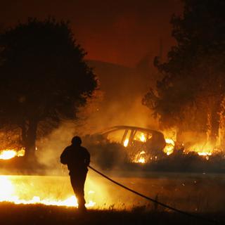 Un demi-millier de pompiers sont mobilisés pour combattre les incendies en France. [AFP - Pascal Pochard-Casabianca]