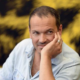 Le réalisateur Jean-Stéphane Bron à Locarno en 2013. [Keystone - Urs Flueeler]