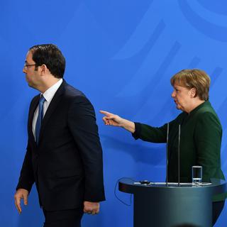 Le Premier ministre tunisien Youssef Chahed en compagnie de la chancelière allemande Angela Merkel. [Ralf Hirschberger]
