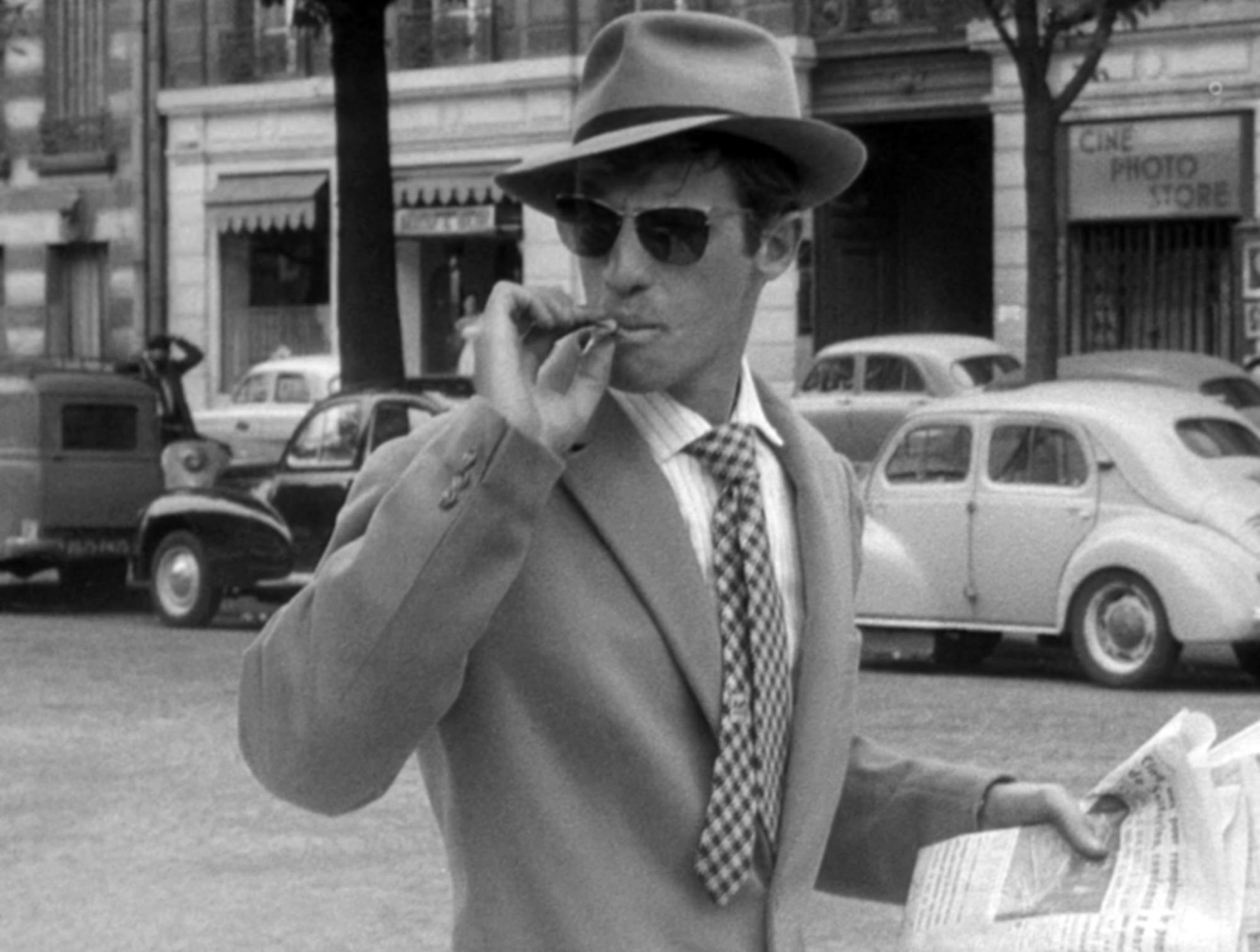 Jean-Paul Belmondo dans "À bout de souffle" de Jean-Luc Godard. [AFP - Productions Georges de Beaureg / Collection ChristopheL]