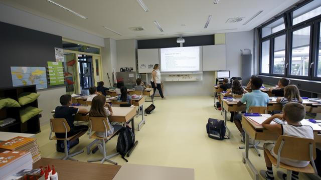 Une classe dans une école du Grand-Saconnex, à Genève. [Keystone - Salvatore Di Nolfi]
