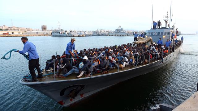 llegal immigrants, who were rescued by the Libyan coastguard in the Mediterranean off the Libyan coast, arrive at a naval base in the capital Tripoli on May 26, 2017. At least 20 boats carrying thousands of migrants on their way to Italy were spotted off the coast of the western city of Sabratha, the Libyan navy said.
MAHMUD TURKIA / AFP [Mahmud Turkia]