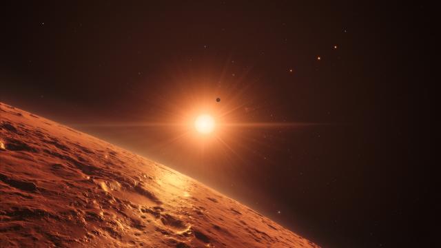 L'étoile Trappist-1 éclaire l'une des sept planètes qui l'entoure. [ESO - M. Kornmesser/spaceengine.org]