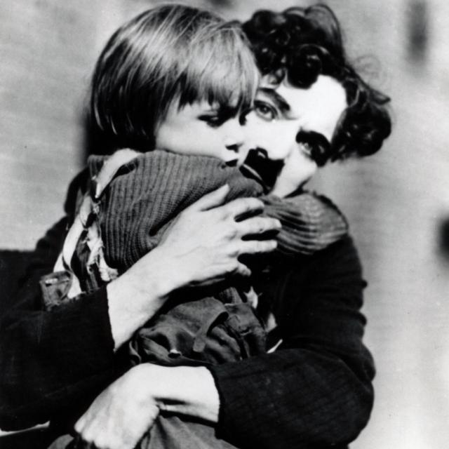 Charlot dans "Le Kid", qui évoque sa propre enfance. [AFP - COLLECTION CHRISTOPHEL © Charles Chaplin Productions]