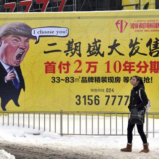 La marque Trump, l’un des piliers de la fortune du président américain, s'installe en Chine. [Chinatopix/AP/Keystone]