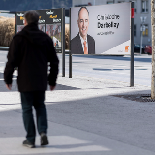 Affiche de campagne de Christophe Darbellay à Sion. [Keystone - Alessandro della Valle]