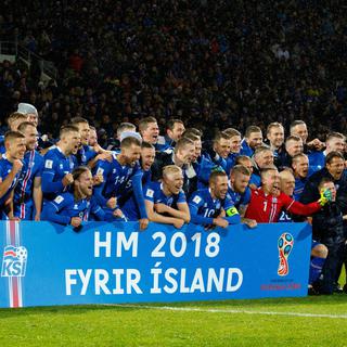 L'équipe d'Islande fête sa qualification le 09.10.2017. [EPA/Keystone - Birgir Thor Hardson]