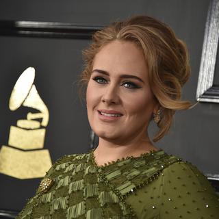 La chanteuse Adele à son arrivée à la 59e cérémonie des Grammy Awards à Los Angeles. [Jordan Strauss]