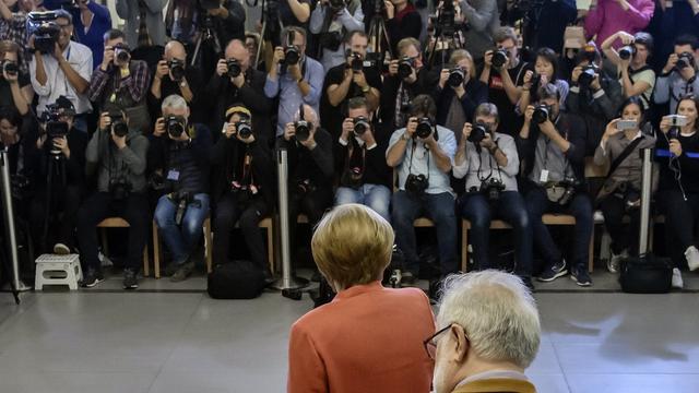 La chancelière Angela Merkel, candidate à un quatrième mandat, a voté à Berlin. [Keystone - EPA/CLEMENS BILAN]