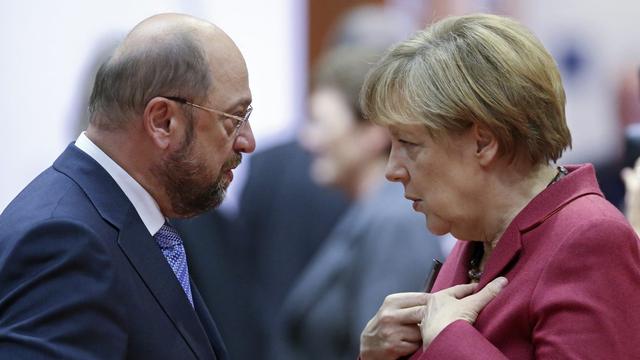 Martin Schulz et Angela Merkel. [EPA/Keystone - Olivier Hoslet]
