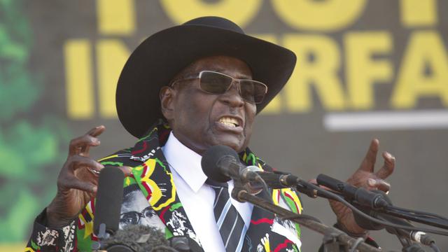 Robert Mugabe lors d'un meeting de son parti à Gweru, au Zimbabwe. [AP Photo/Keystone - Tsvangirayi Mukwazhi]