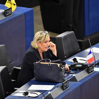 STRASBOURG, FRANCE - JANUARY 17 : Marine Le Pen, leader of the French National Front, speaks on the mobile phone at the plenary session of the European Parliament during the second tour of the European Parliament president election in Strasbourg, France, on January 17, 2017. Mustafa Yalcin / Anadolu Agency 
MUSTAFA YALCIN / ANADOLU AGENCY [afp - Mustafa Yalcin]