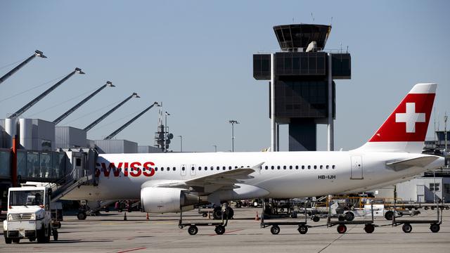 Un avion de Swiss à l'aéroport de Genève. [Keystone - Salvatore Di Nolfi]