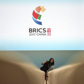 Le Brésil, la Russie, l'Inde, la Chine et l'Afrique du Sud se sont réunis en Chine ce week-end pour le sommet 2017 des BRICS. [Keystone - Fred Dufour - EPA]