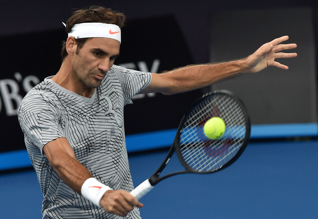 Roger Federer prépare son grand retour. [AFP - Paul Crock]