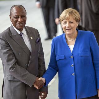 Angela Merkel a accueilli lundi le président guinéen Alpha Condé. [NurPhoto/AFP - Omer Messinger]