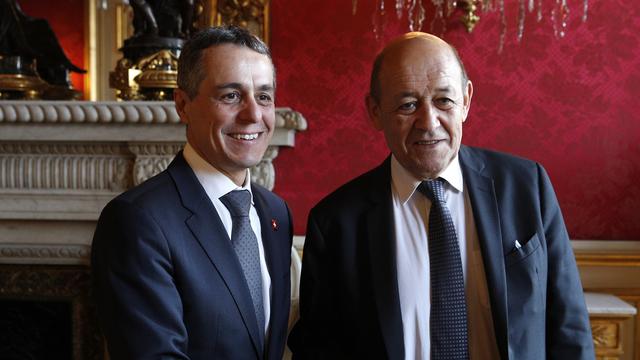 Le chef de la diplomatie Ignazio Cassis (à gauche) et son homologue français Jean-Yves Le Drian. [Christophe Ena]