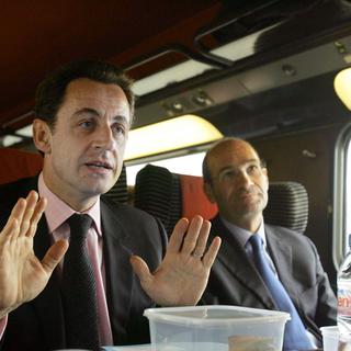 Nicolas Sarkozy et Eric Woerth pendant la campagne présidentielle 2007. [AFP - Dominique Faget]