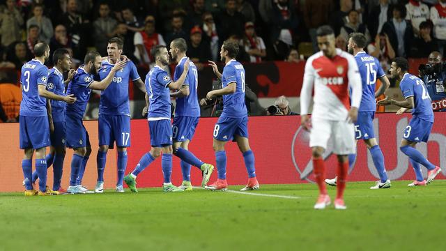 Higuain (3e depuis la gauche) permet à la Juve de se rapprocher grandement de la finale de Cardiff. [Claude Paris]