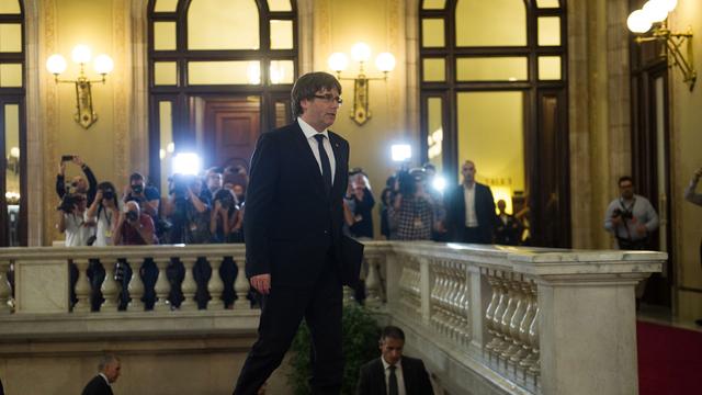 Carles Puigdemont à son arrivée au Parlement catalan. [Anadolu Agency/AFP - Lola Bou]