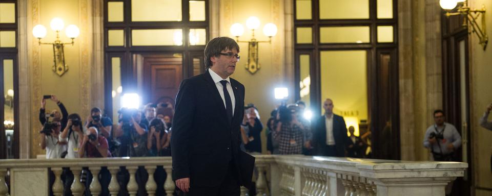 Carles Puigdemont à son arrivée au Parlement catalan. [Anadolu Agency/AFP - Lola Bou]