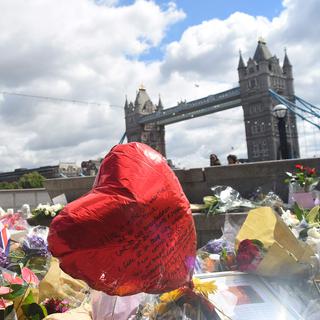 Des fleurs et des messages déposés en hommage aux victimes de l'attentat survenu à Londres le 3 juin 2017.
Alberto Pezzali/NurPhoto
AFP [AFP - Alberto Pezzali/NurPhoto]
