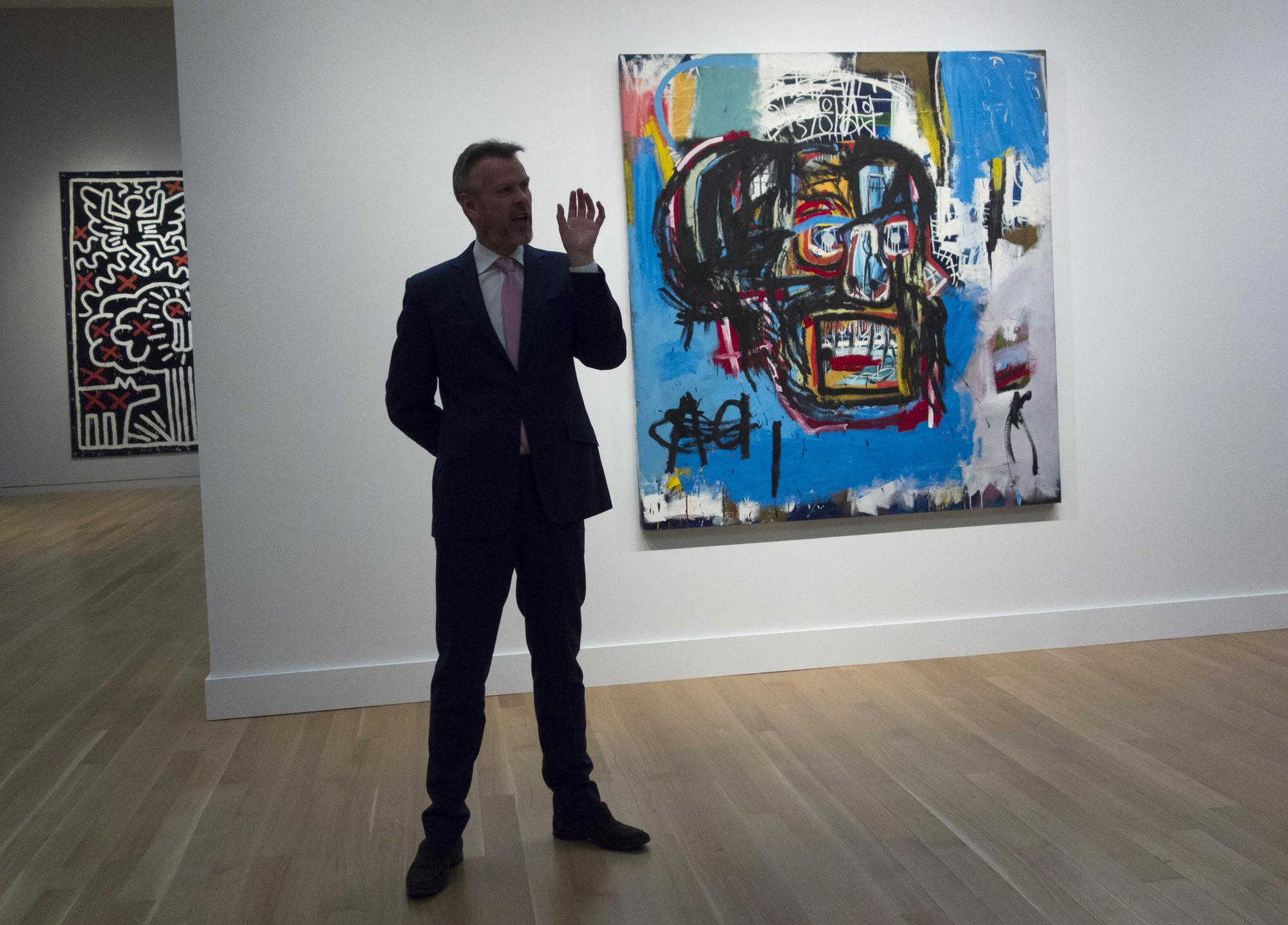 Ce tableau sans titre de Jean-Michel Basquiat avait été acheté 19'000 dollars en 1982. [AFP - Don Emmert]