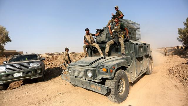 Des troupes irakiennes mercredi à Tal Afar. [Keystone - EPA/MURTAJA LATEEF]