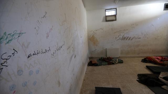 A picture taken on March 31, 2016 shows makeshift beds at a former prison cell that was used by Islamic State fighters in the ancient city of Palmyra, some 215 kilometres northeast of Damascus. Syrian troops backed by Russian forces recaptured Palmyra on March 27, 2016, after a fierce offensive to rescue the city from jihadists who view the UNESCO-listed site's magnificent ruins as idolatrous.
JOSEPH EID / AFP [AFP - JOSEPH EID]