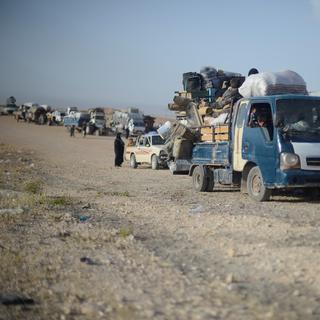 Des habitants fuient Raqa avant les combats. [AFP - Huseyin Nasir]