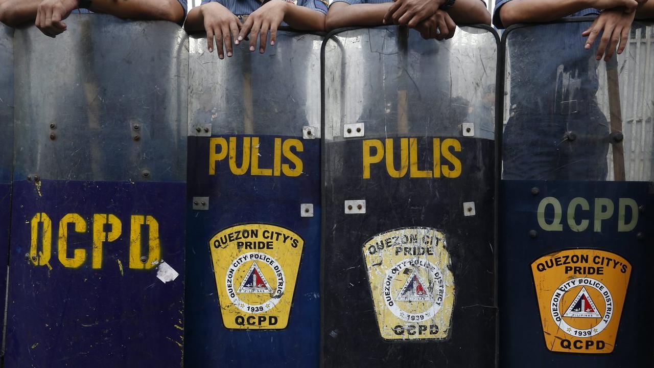 Un rapport d'Amnesty International montre du doigt les meurtres extrajudiciaires commis par la police philippines (photo d'illustration). [EPA - Rolex Dela Pena]