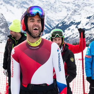 Le skieur Didier Défago hilare durant une session d'entrainement à Wengen en janvier 2015. [Keystone - Jean-Christophe Bott]