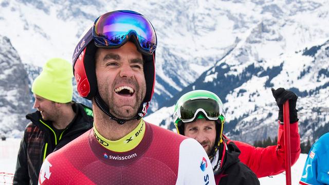 Le skieur Didier Défago hilare durant une session d'entrainement à Wengen en janvier 2015. [Keystone - Jean-Christophe Bott]