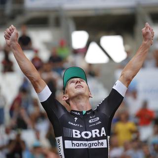 Maciej Bodnar célèbre sa 1re grande victoire en carrière lors de la 20e étape du Tour de France. [Christophe Ena]