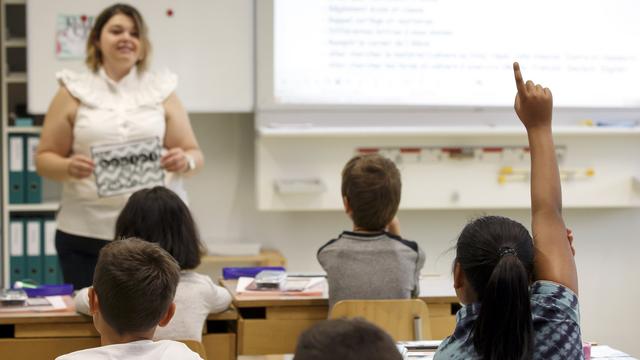 Une classe de 7ème primaire du Grand-Saconnex, lors de la rentrée 2016. [Keystone - Salvatore di Nolfi]