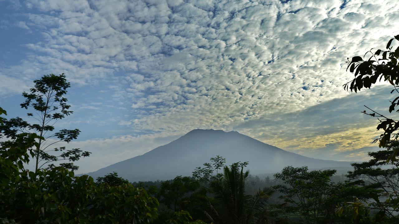 Le volcan Agung, à Bali. Plus d'un millier de personnes avaient péri dans sa dernière éruption en 1963. [AFP - SONNY TUMBELAKA]