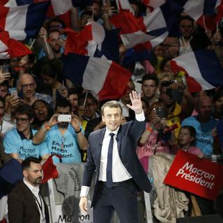 Emmanuel Macron lundi à Paris Bercy. [AFP - Geoffroy Van Der Hasselt]