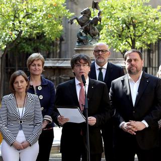 Le président catalan Carles Puigdemont lors de l'annonce du référendum vendredi. [EPA/Keystone - Toni Albir]