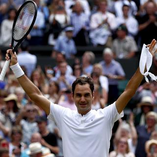 Roger Federer est le maître des lieux à Wimbledon après sa 8e victoire. [Nic Bothma]