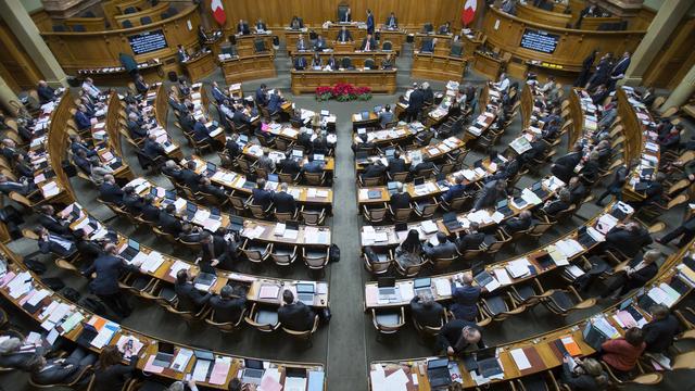 Le Conseil national réuni pour la session d'hiver ce jeudi 7 décembre. [Keystone - Peter Klaunzer]