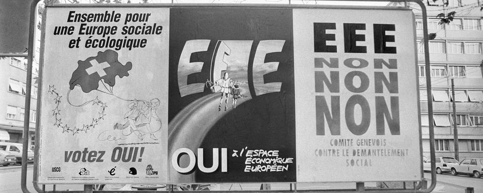 Des affiches de vote en vue de la votation sur l'adhésion de la Suisse à l'Espace économique européen (EEE), le 6 décembre 1992. [Keystone]