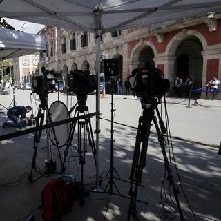 Des journalistes devant le Parc de la Ciutadella à Barcelone.
PAU BARRENA
AFP [PAU BARRENA]